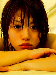 Hitomi Hayasaka Asian teen is disrobing for a hot bath